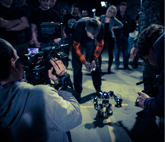 Camera filming a robot