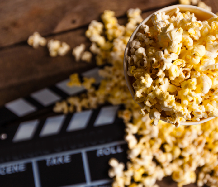 Clapperboard and popcorn
